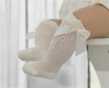 Hoge katoenen bow sokjes creme