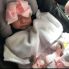 Newborn muts wit met roze strik van lint extra warm