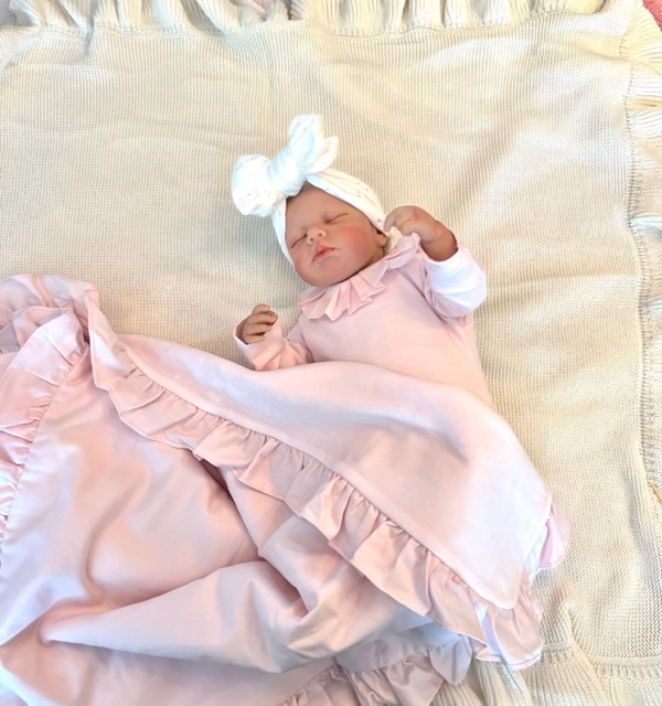 Pink girly ruffle dekentje